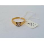 A solitaire diamond ring in 18ct gold setting size O 3.7g