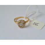 A diamond rub over style cluster ring in 18ct gold mount size P 3.1g inc