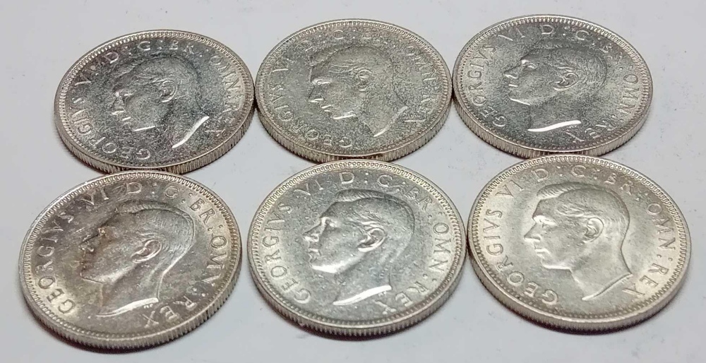 Six George 6th silver shillings better grade