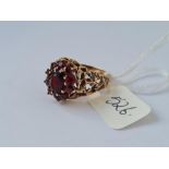 Garnet cluster ring in 9ct pierced mount size O 5.2g inc