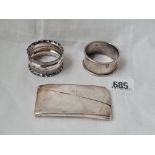 A envelope shaped card case and two napkin rings 72 gms