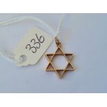 A star of David 14ct gold pendant 1.1g