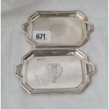 A pair of miniature two handled tray engraved with thistle and rose motives 4 3/4 long 99 grm