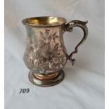 A Exeter pint tankard with embossed decoration gilt interior 5 inches high 1872 by TS 300 gms