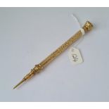 Antique ornate gold cased propelling pencil with amethyst stone terminal