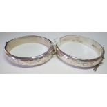 Two silver engraved bangles - 38gms