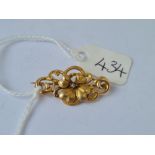 A small floral brooch in 15ct gold 3g