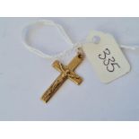 A small gold crucifix 1.6g