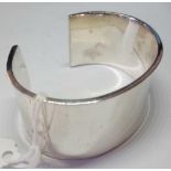 A heavy silver cuff bangle - 80.7gms