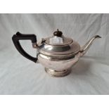A circular teapot on rimmed foot Birmingham 1920 434 gms
