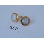 A pair of circular opal earrings in 9ct mounts 4.1g