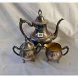 A baluster shaped three piece tea set