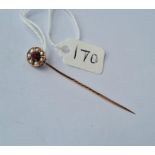 A gold unmarked garnet & pearl cluster stick pin