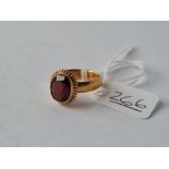 AN EDWARDING GARNET RING IN 22CT GOLD - size N - 6.5gms