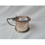 A heavy drum mustard pot with gadroon rims shell thumb piece, Sheffield 1928 broken BGL 158 gms net