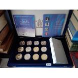 A Royal Mint cased set of twelve Silver Crowns