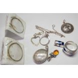 A quantity of assorted silver lockets, rings, pendants & earrings