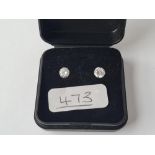 A pair of earrings with white stones - hallmarked on stems - mixed colour butterflies in 9ct