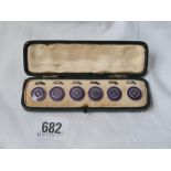 A Boxed set of six silver and enamel studs Birmingham 1905 by LE