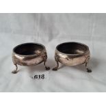 A pair early George III salts on pad feet 2 1/2inch diam, London 1766 75 gms