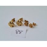 Two pairs of 9ct ear studs