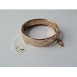 A rolled gold engraved bangle