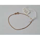 A small bracelet in 9ct - 1.3gms