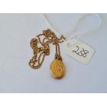 A floral engraved 9ct locket on 9ct fine link chain 3.1g