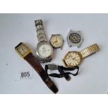 A bag of various wrist watches