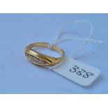 A five stone boat shaped diamond ring in 18ct gold mount size J 4.4g