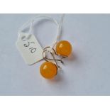 An Indian 21ct gold on silver amber earrings