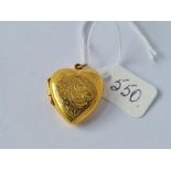 A heart back & front locket in 9ct - 3.2gms