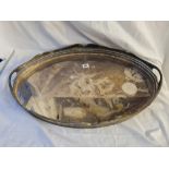 A large oval gallery tray with recessed handles 24 inches wide