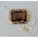 A large rectangular smoky quartz brooch in 14ct gold mount 12g inc