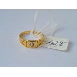 A diamond set gypsy ring in 18ct gold size P 4.1g