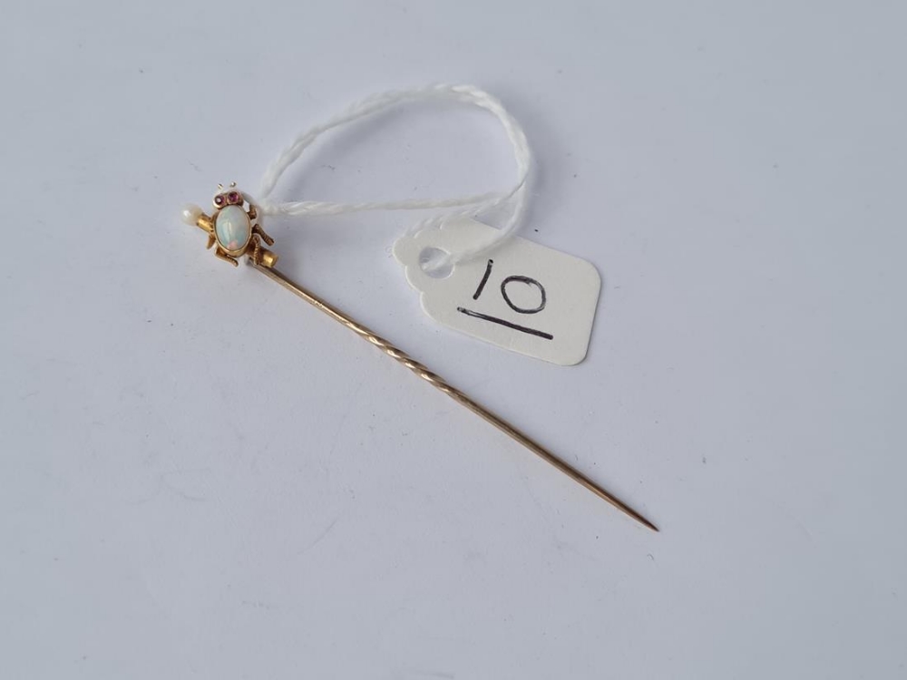 A Victorian opal set bug stick pin with ruby eyes in 15ct gold - Image 4 of 4