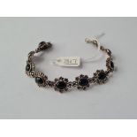 A silver & onyx panel bracelet