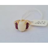 An opal and ruby 18ct gold dress ring size J 4.8g inc