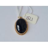 A black onyx 9ct mounted pendant