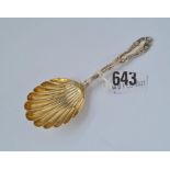 A decorative late Victorian caddy spoon with scroll edge, Birmingham 1898 by JR ltd