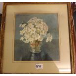 F M HOMEWOOD ? A vase of primroses, 9 by 8 1/2