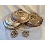 A set of four old Sheffield circular entrée dishes and covers with gadroon rims 9 1/2 inches diam