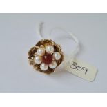 A pearl and cornelian flower head ring in 9ct mount size L 6.9g inc