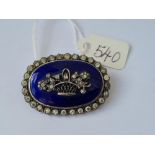 A heavy antique silver & enamel paste set brooch