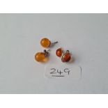 Two pairs of amber earrings