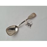 A Victorian Newcastle fiddle pattern long handled caddy spoon 1866 by TS