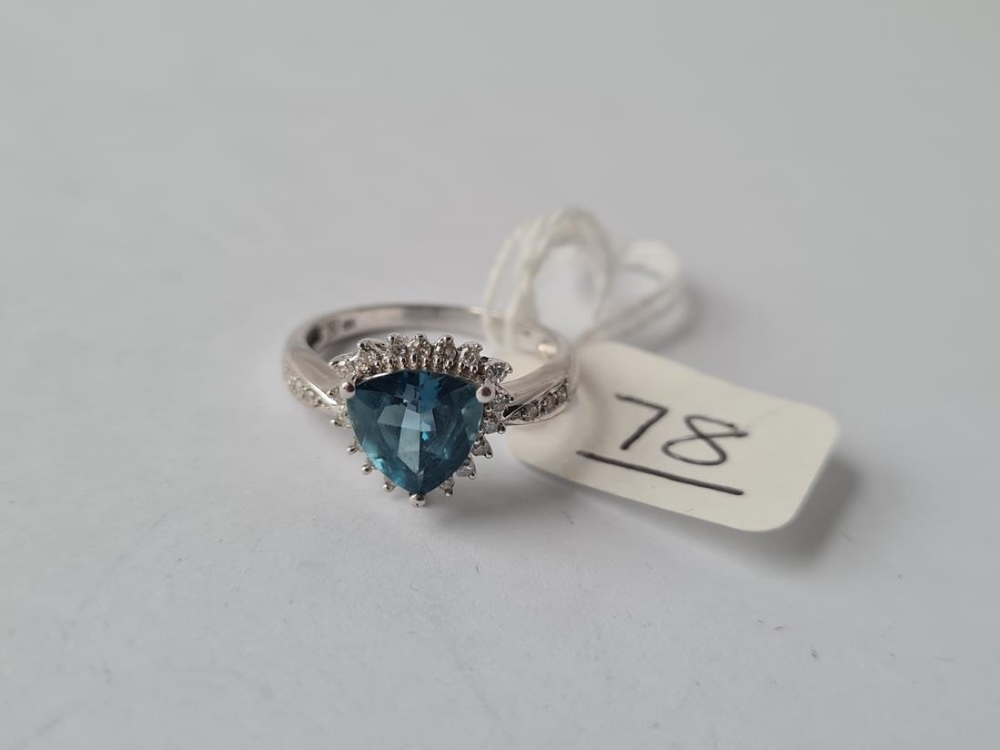 A white gold blue topaz trillion cut ring with diamond accents - 9ct hallmarked - size M - 2.8gms