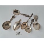 A six various decorative caddy spoons