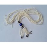 A multi strand fresh water & lapis lazuli pendant necklace