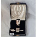 A boxed christening set of napkin ring spoon and egg cup with 1935 silver jubilee mark
